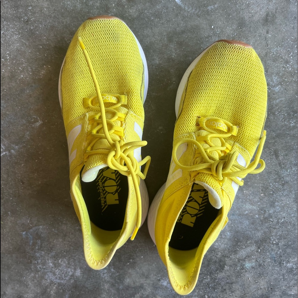 New Balance women’s yellow sneakers